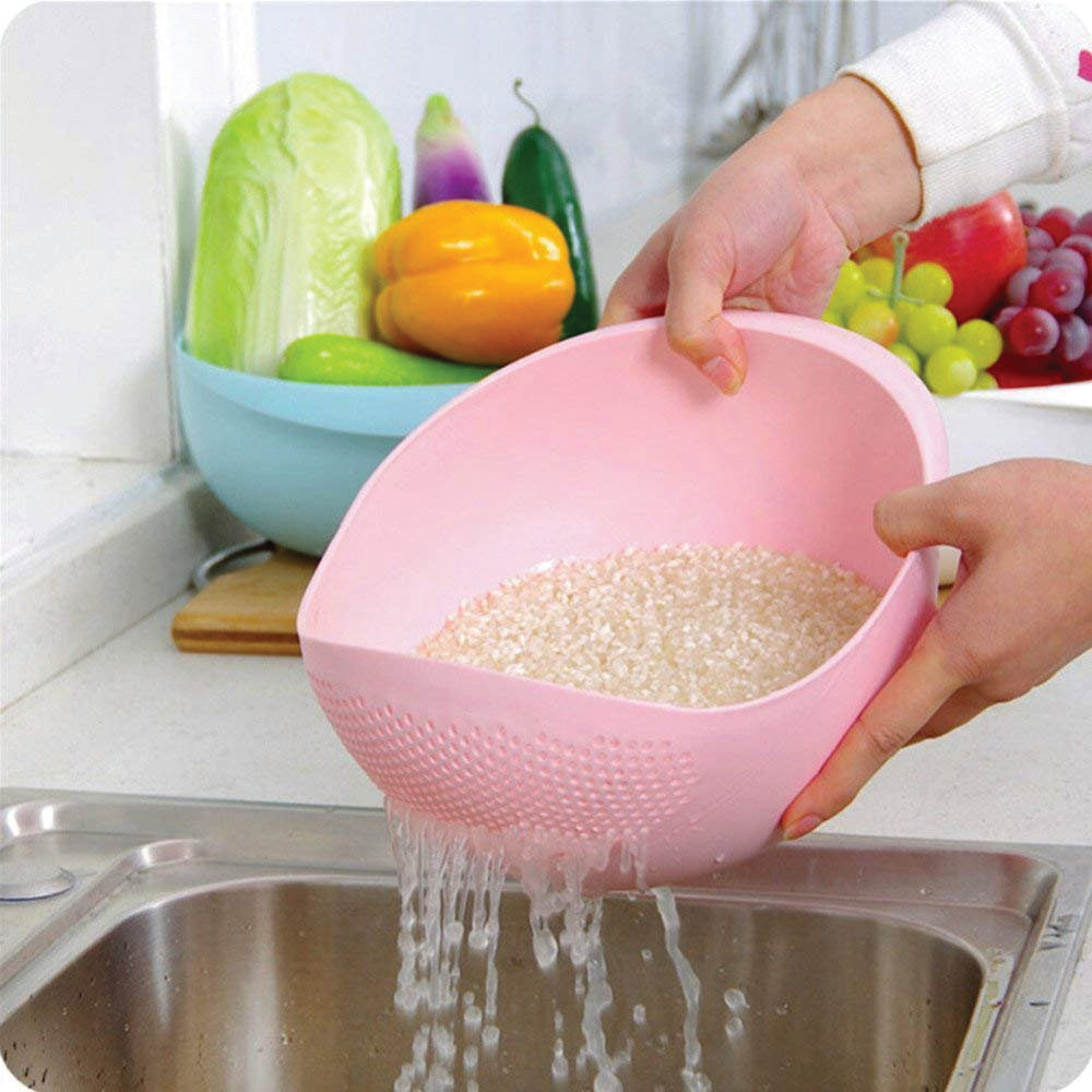Large plastic strainer bowl for rinsing and storing rice and other grains. Large plastic strainer bowl for rinsing and storing rice and other grains.